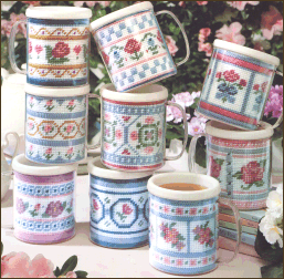 Floral Mugs In Plastic Canvas